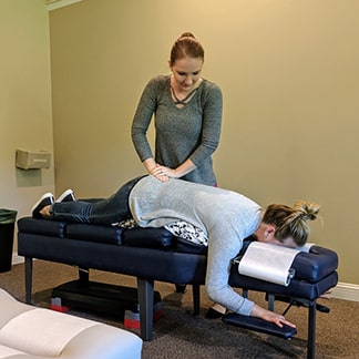 Adel Adult Chiropractic Patient Lying on Back